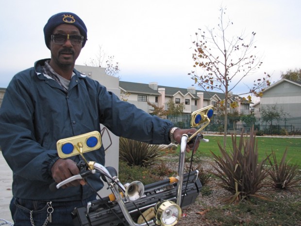 I saw this guy cruising around West Oakland. And, yes, that's a boombox.