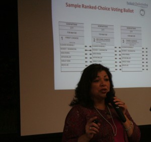 Cynthia Cornejo Cynthia Cornejo explains the ranked choice voting system using the sample ballot that Oakland voters received in the mail this month. Ranked choice voting makes its Oakland debut this November in local races. Photo by Evan Wagstaff.