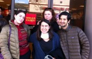 Gaylynne Hudson (Back Center) stands in front a Wells Fargo branch in Fruitvale with other Oakland residents who came to protest the sale of her home. Photo: Courtesy of ACCE.