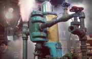 At Kinetic Steam Works, a printing press is powered by steam.