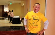 Man wearing yellow shirt.
