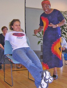 Stagebridge performer Olithia O’Toole interacts with a nursing student in an improvised wellness skit. (Photo courtesy of Stagebridge)