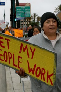 A rally outside the Woodfin Suites Hotel in Emeryville. by David Bacon.