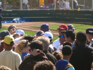 mob Henderson is mobbed by autograph-seekers after the ceremony.