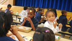 Two girls eat their lunch at Hoover Elementary.