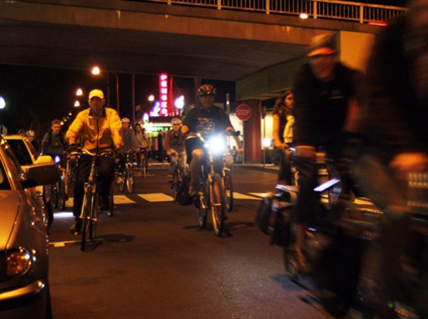 Bike Partiers roll down 4th Street in Berkeley.