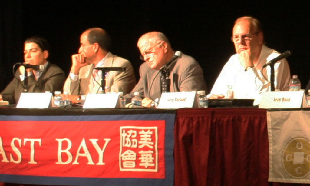 Mayoral candidate Greg Harland (far right) sits next to follow candidates (from left to right) Rebecca Kaplan, Joe Tuman and Don Perata at a forum at the Oakland Asian Cultural Center. Harland says his main goals are to reduce crime, increase employment and solve the deficit problem. Photo by Evan Wagstaff.