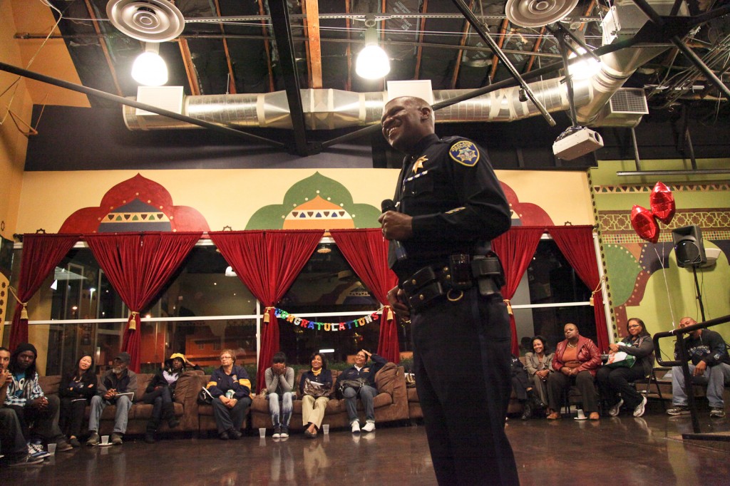 Oakland Police Captain Ersie Joyner addresses the dangers associated with the reckless driving congregations known as sideshows at a reception on Monday night.