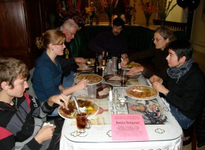 Customers eat Customers at Asmara in Temescal enjoy traditional Ethiopian and Eritrean food. Photo by Alyssa Fetini.