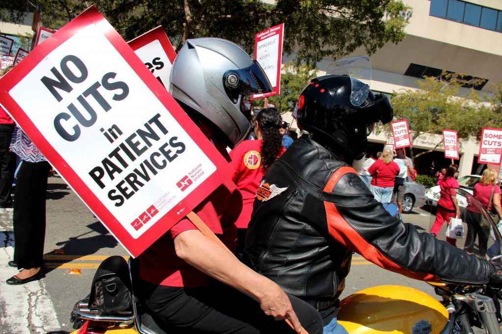 Nurses and supporters waved signs during Thursday's strike at Alta Bates Summit Medical Center.