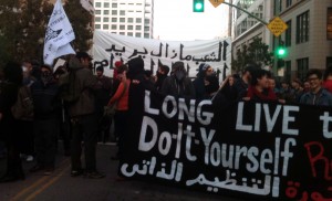About 200 people march on Clay Street in support of anti-government demonstrations in Egypt.