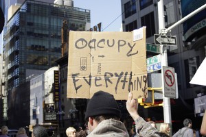 occypyeverything One Occupy Wall Street demonstrated holds a sign that reads "Occupy Everything." Photo by David Shankbone.