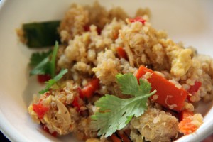 Rock Harper serves up his main course, steaming vegetables and chicken quinoa.
