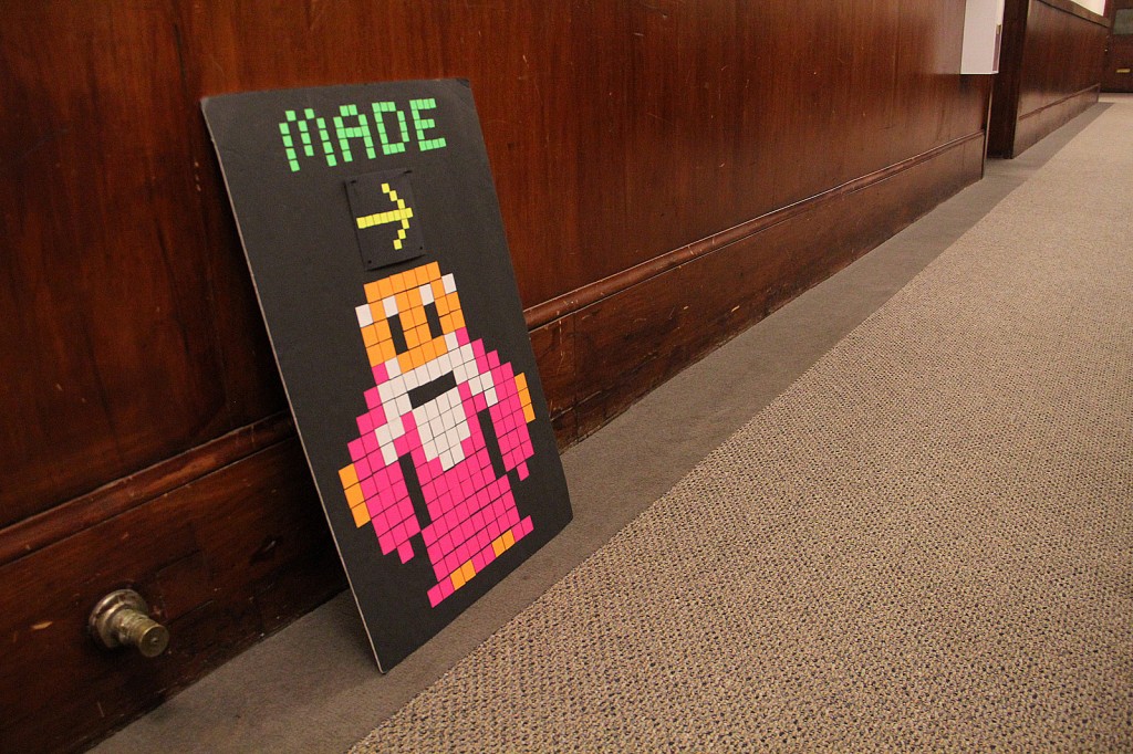 A hallway sign points the way to the new MADE space in downtown Oakland.