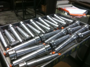 Some of an order of drive shaft parts for the Bradley Fighting Vehicle before being delivered to the US Army.