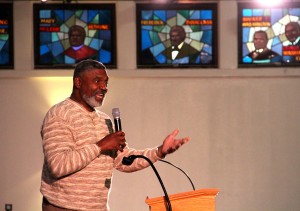Allen Temple Baptist Church Deacon Reginald Lyles asks community members to help reduce violence.