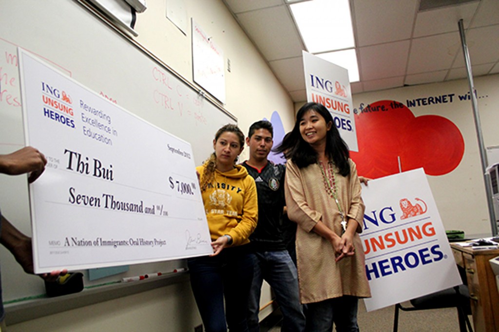 Oakland International High School teacher Thi Bui, at right, was awarded $7,000 by the ING Unsung Heroes program.