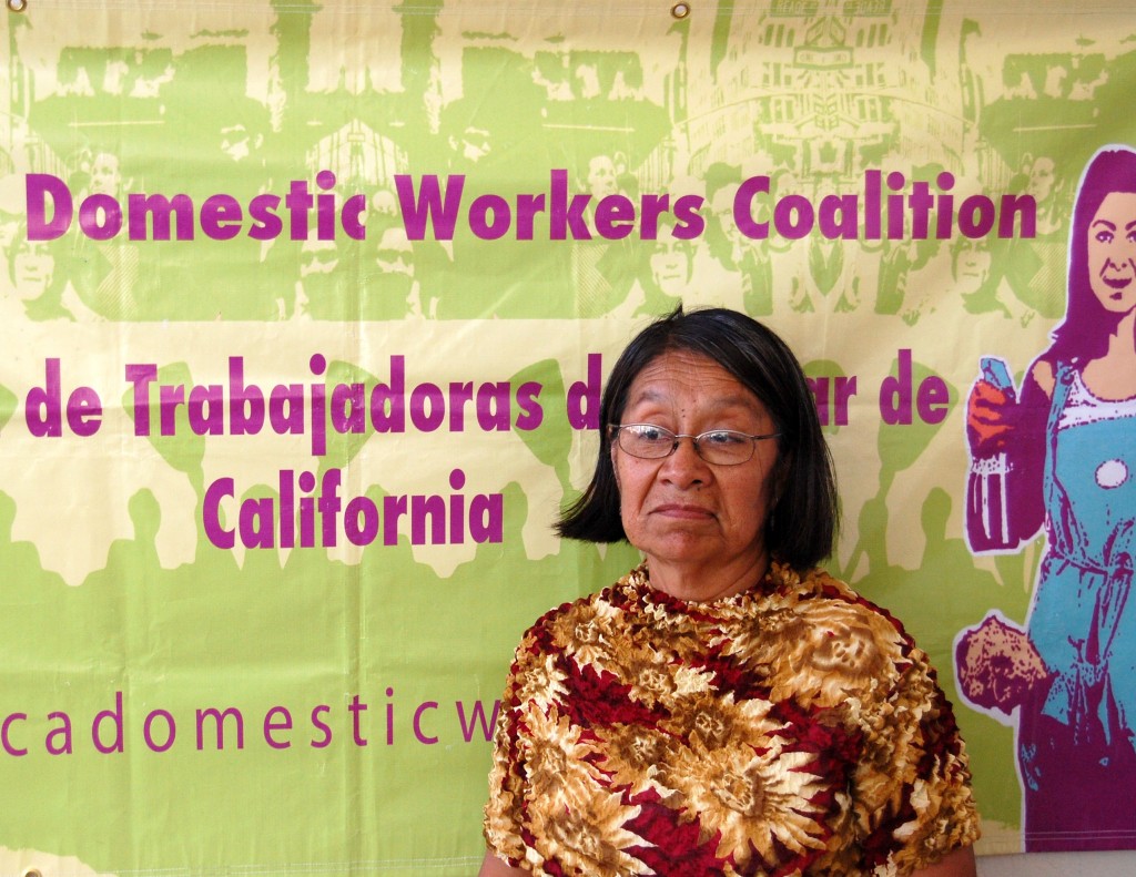 Maria Santiago, a domestic worker, at Mujeres Unidas y Activas' office in Oakland.