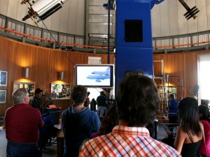 The Endeavour flyover is played inside on video screens.
