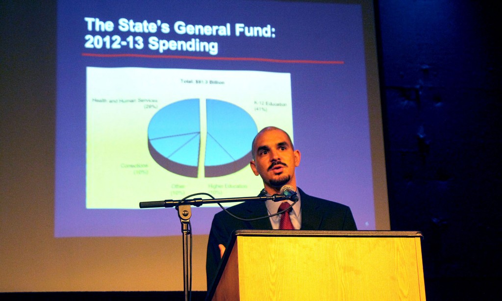 Edgar Cabral, principal fiscal and policy analyst at the California Legislative Analyst’s Office, informs the crowd of California's two new tax propositions at the forum on Wednesday night.