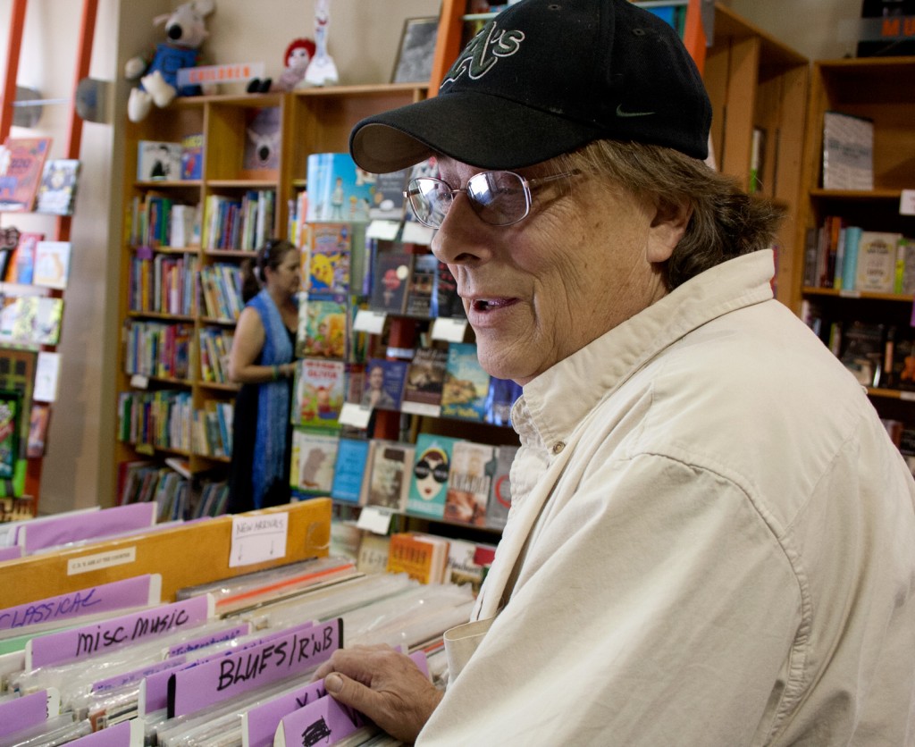 Berigan Taylor, former owner of the shuttered record store that inspired Michael Chabon's fictitious Brokeland Records, looks through records at Diesel Bookstore.