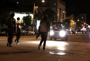 Protesters encounter police at the intersection of Telegraph and Grand Avenues. Photo by Charles Berkowitz.