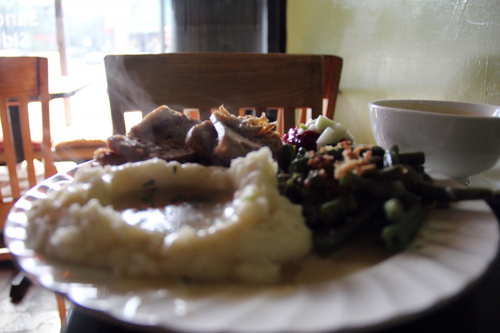 No animals were harmed in the making of this meal: At The Breakroom Cafe on 13th Street and Harrison, the classic Thanksgiving meal is done vegetarian style. Pictured: vegetarian mash potatoes and gravy, greens, cranberry sauce, faux turkey and stuffing.
