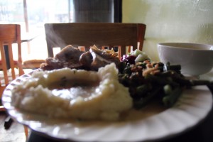 No animals were harmed in the making of this meal: At The Breakroom Cafe on 13th Street and Harrison, the classic Thanksgiving meal is done vegetarian style. Pictured: vegetarian mash potatoes and gravy, greens, cranberry sauce, faux turkey and stuffing.
