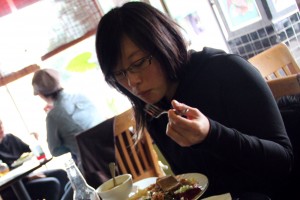 Atsuko Itakura dines on the vegetarian Thanksgiving special at The Breakroom Cafe on a recent Saturday. "This is my Thanksgiving, actually," said Itakura, who's traveling to Vancouver on November 22.