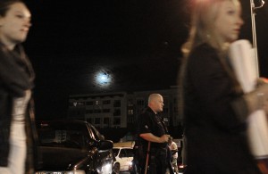 Security is the greatest cost associated with putting on First Friday. At the November 2 event, OPD officers and private security guards maintained a strong presence. Some were stationed along the perimeters of the barricaded streets, some walked through the crowds in small packs, and others managed the traffic that crossed the fair at major intersections.