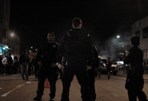 Security is the greatest cost associated with putting on First Friday. At the November 2 event, OPD officers and private security guards maintained a strong presence. Some were stationed along the perimeters of the barricaded streets, some walked through the crowds in small packs, and others managed the traffic that crossed the fair at major intersections.