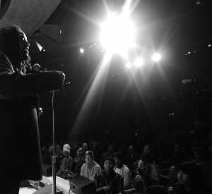 While accepting his award, Weston tells tales of awaiting local radio stations to play hip-hop on Saturday's as a kid, the only time they ever played hip-hop; the audience laughs.