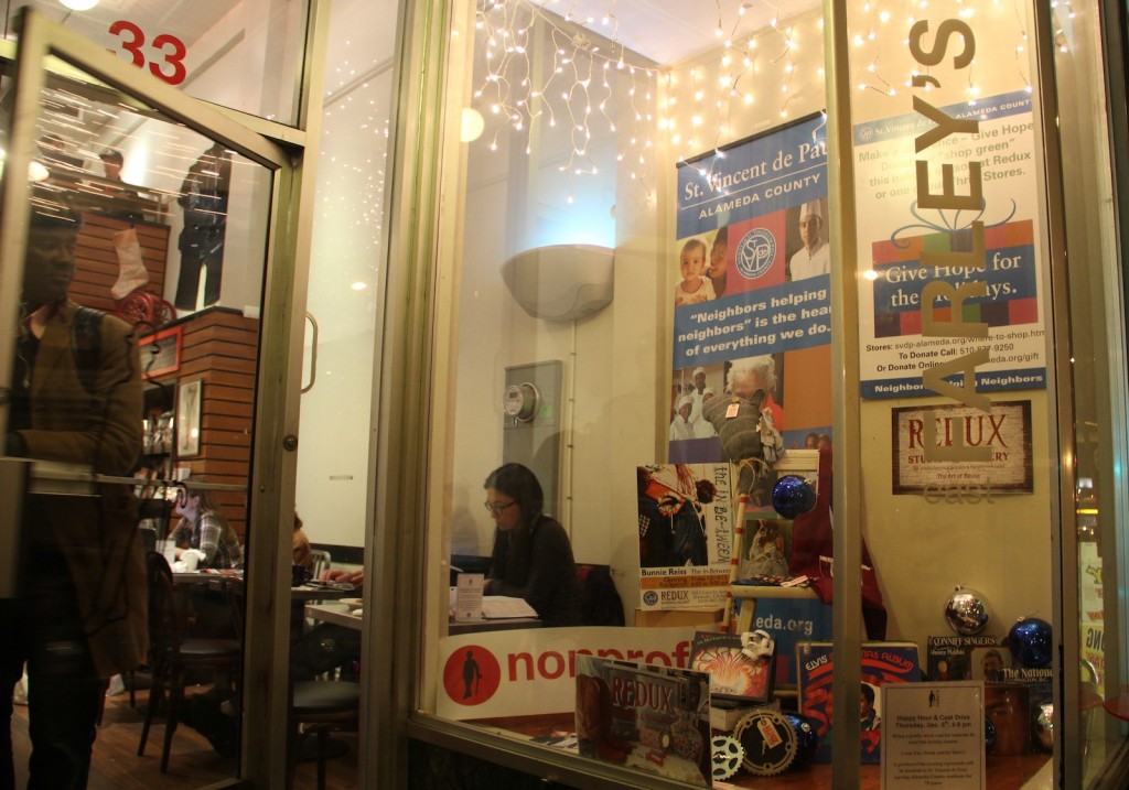 The Saint Vincent de Paul Display window at Farley's East includes items from the charity's reuse-centered gallery space and retail center in Alameda, Redux.