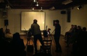 John David and Josh Churchchill prepare for the performance at Shapeshifters Cinema Sunday night.