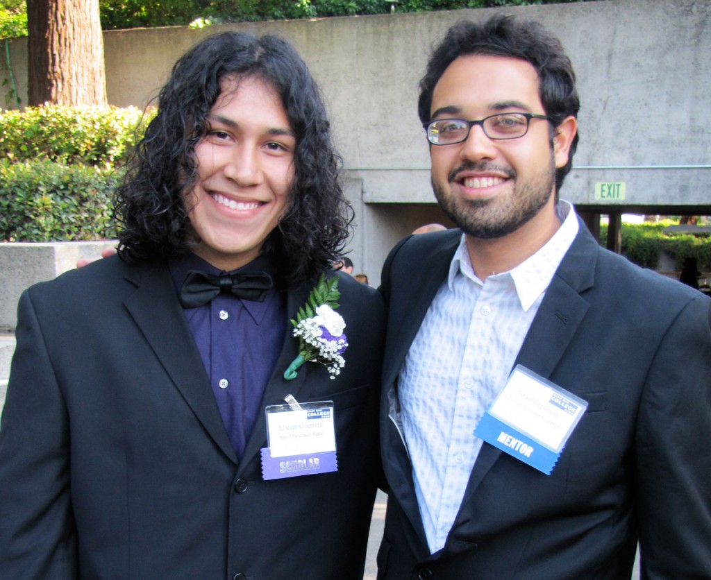Eliezer Guerrero and his mentor, Israel Figueroa, celebrate Guerrero's scholarship