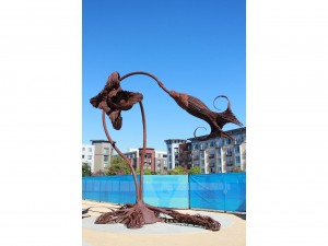 "Trumpet Flowers" by West Oakland artist Karen Cusolito are made from recycled steel, like most of her creations.