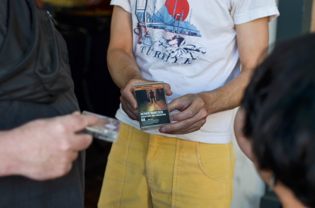 Todd Hudson of VAMP holds this Herbie Hancock cassette tape out for prospective buyers.