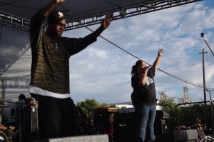 Keak da sneak makes a surprise appearance, dancing alongside CMG of the legendary 1990s female rap duo Conscious Daughters. Photo by James Reddick.
