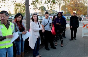 Not sure if there will be another bus to San Francisco, commuters anxiously line up in front of the West Oakland BART station just before 8 o'clock. Photo by James Reddick