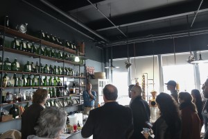 Lance Winters of St. George Spirits in Alameda gives visitors a tour of the distillery housed in a formal naval hangar.