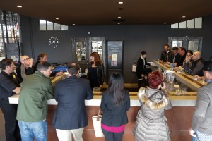 Tour guides Lauren Asta (right) and Ayn Kirkendall (left) serve samples to guests in St. George's tasting room.