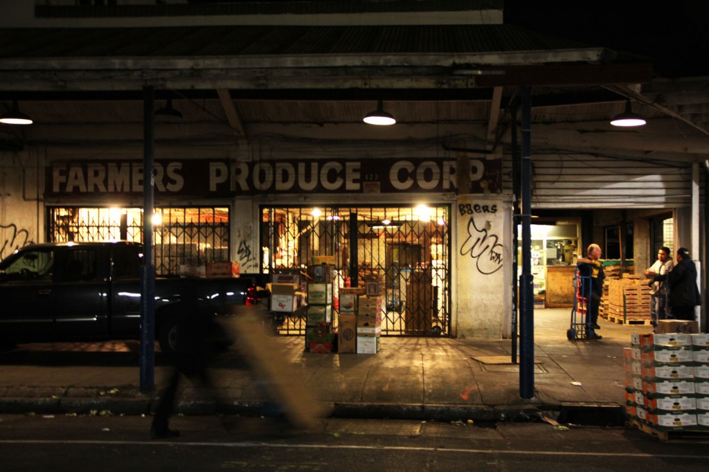 Workers at the wholesale produce market