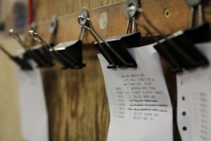 Receipts are pinned to a board