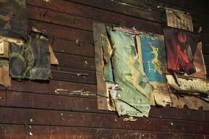 Old fashioned pinups on the market walls.