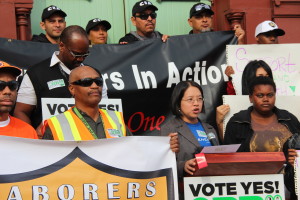 Image of Measure B supporters gathered at a rally.
