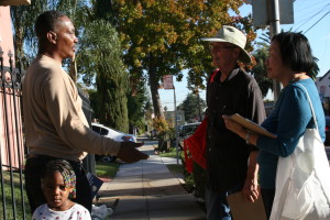 3:47 p.m. While Quan goes door-to-door in the Maxwell Park neighborhood, this man explains how family members can’t get from the street to his house because the sidewalk is uneven. Quan makes a mayor’s call, on the spot, to file a complaint. Photo by Joshua Escobar.