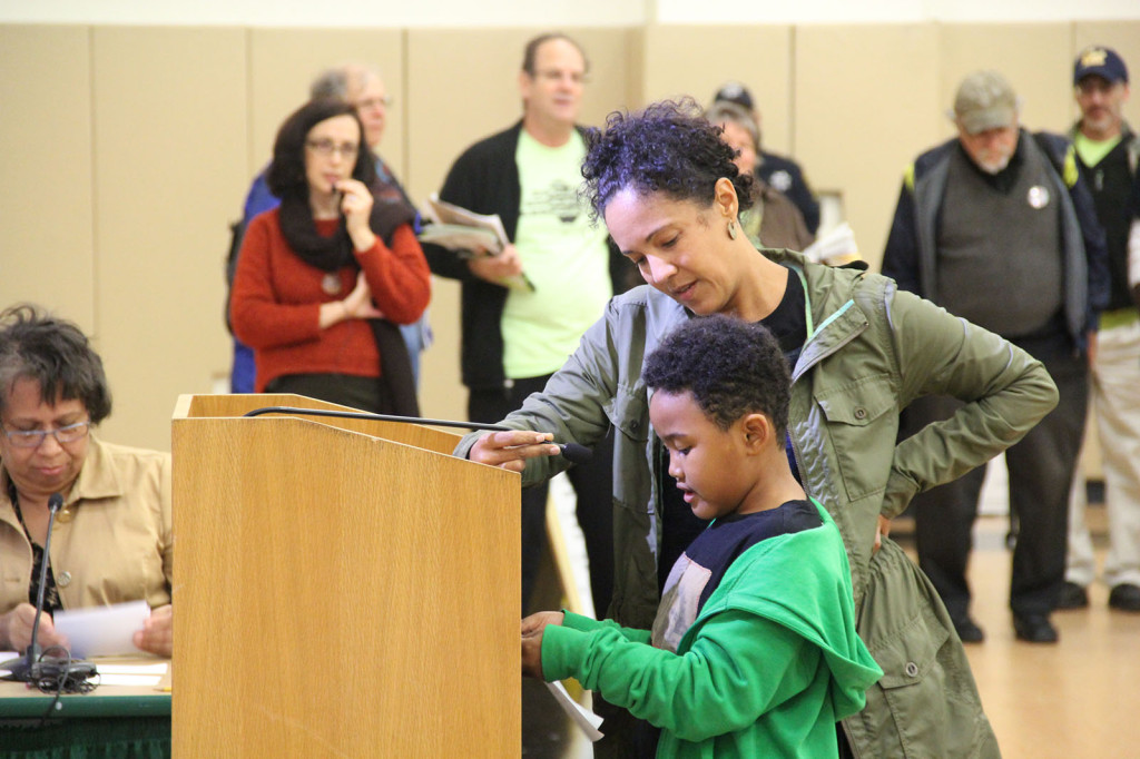 "Please support our education and limit class size," said Pharroh Mosley-Katakanga, with his mother Maya at Wednesday's School Board meeting.