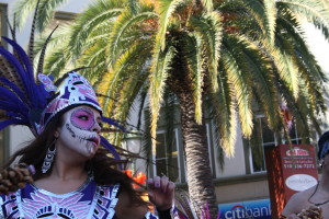 The sound of drums and the scent of incense that smell like burning tires and licorice fill the air as some 35 dancers from Movimiento Cultural Anahuac move like fire in the Fruitvale plaza.