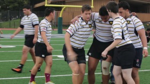 A Danville Oaks rugby player gets carried off the field during a game against the Oakland Warthogs at Laney College in Oakland on March 1.