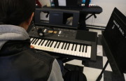Student at McClymonds High School participates in piano class. It is the first time in 12 years that McClymonds has offered music classes.